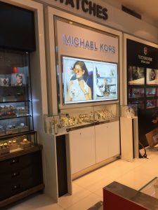 troca visual merchandising backlight Michael kors